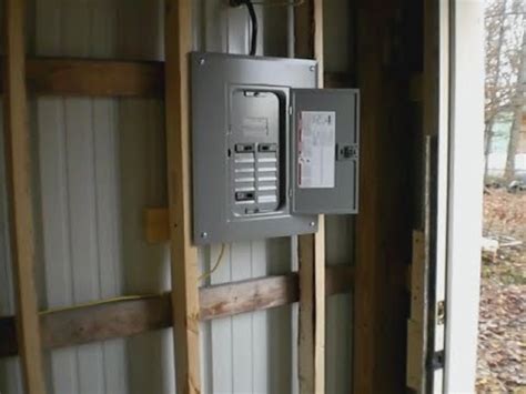 attaching a breaker box to outside of metal shed|running electric underground to shed.